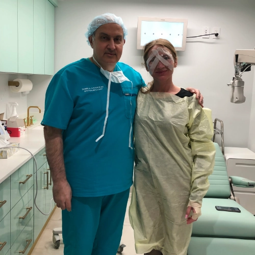 Happy female patient next to Dr. Khosrof
