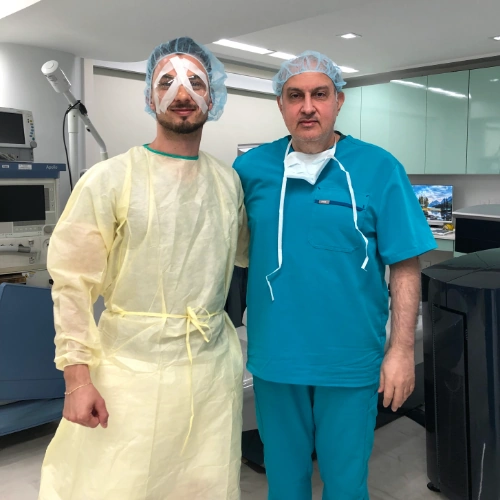 LASIK surgeon, Dr. Khosrof, next to patient