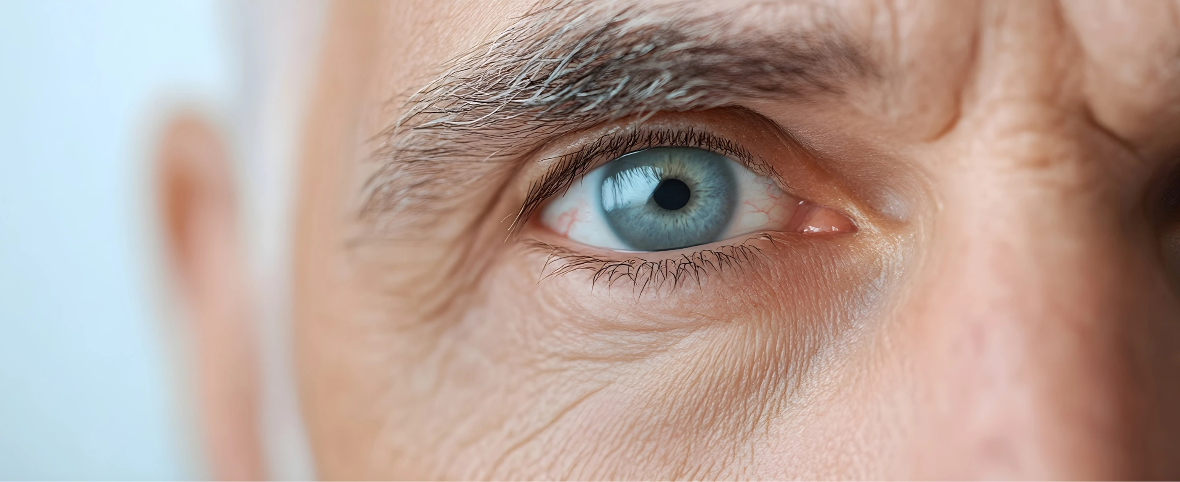 senior man eye close up