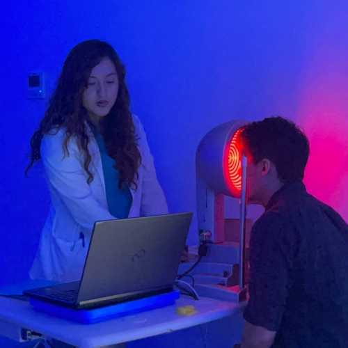 I Love LASIK doctor examining patient's vision