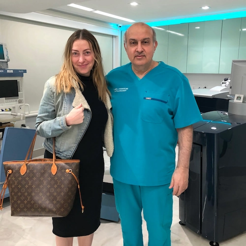 Dr. Khosrof standing with patient