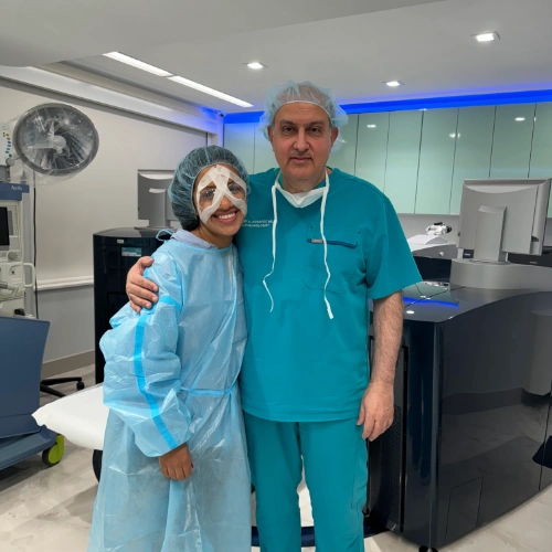 LASIK surgeon, Dr. Khosrof, next to patient