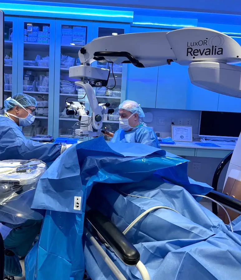 Dr. Khorsof performing eye surgery on patient