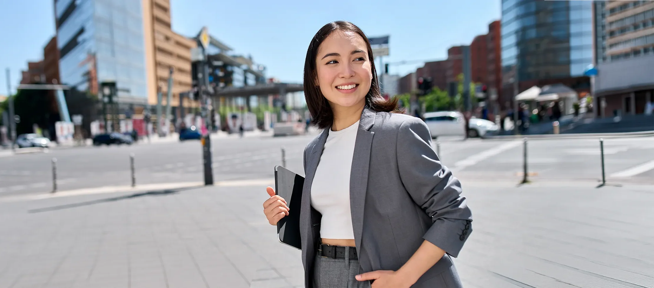 confident business woman walking in NYC enjoying clear vision