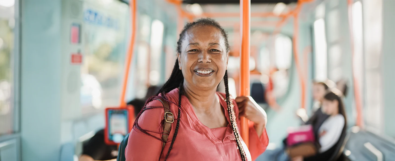 older woman commuting on the bus with clear vision