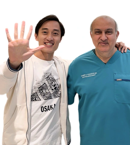 Happy male EVO ICL patient with Dr. Khosrof
